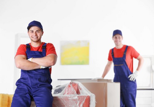 Student removal team helping with boxes and furniture in Hammersmith
