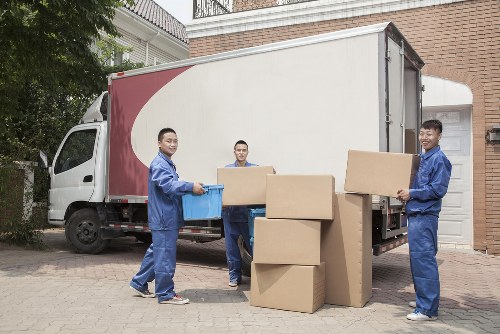 Loading furniture and boxes into a van for a local Hammersmith move
