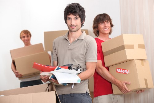 Protective wrapping and piano moving equipment used during a removals job