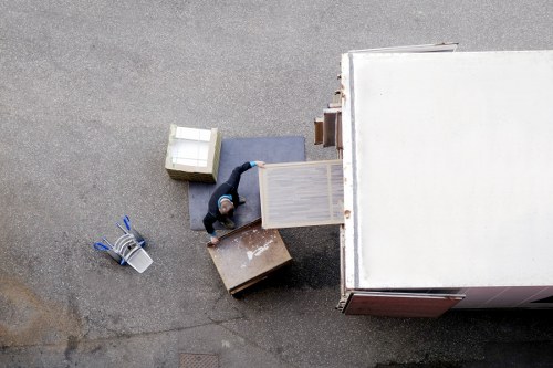 Removal van navigating a busy Hammersmith street