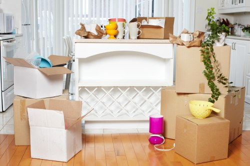 Furniture pick-up service for a sofa and chair in a Hammersmith flat