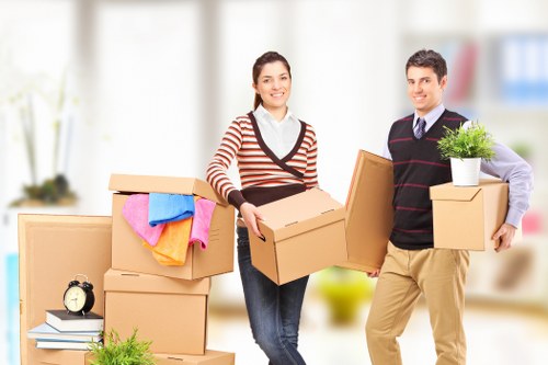 Loading household items into a van for a local move in Hammersmith