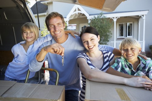 Insured Hammersmith removal van handling furniture with care