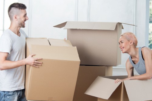 Careful packing of fragile items for a residential move in Hammersmith
