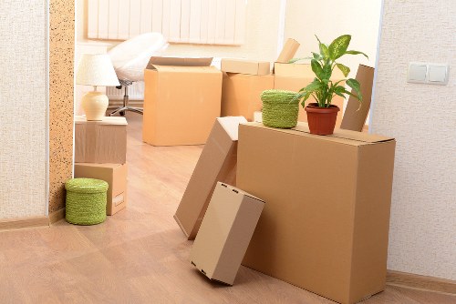 Local team removing bulky bedroom furniture from a London property